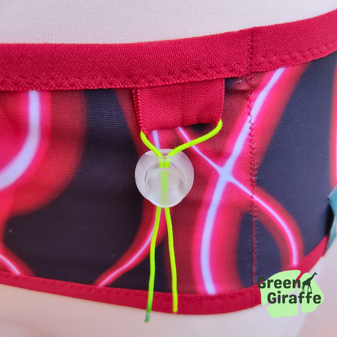 RunPouch Running Belt - Red wire - Green Giraffe