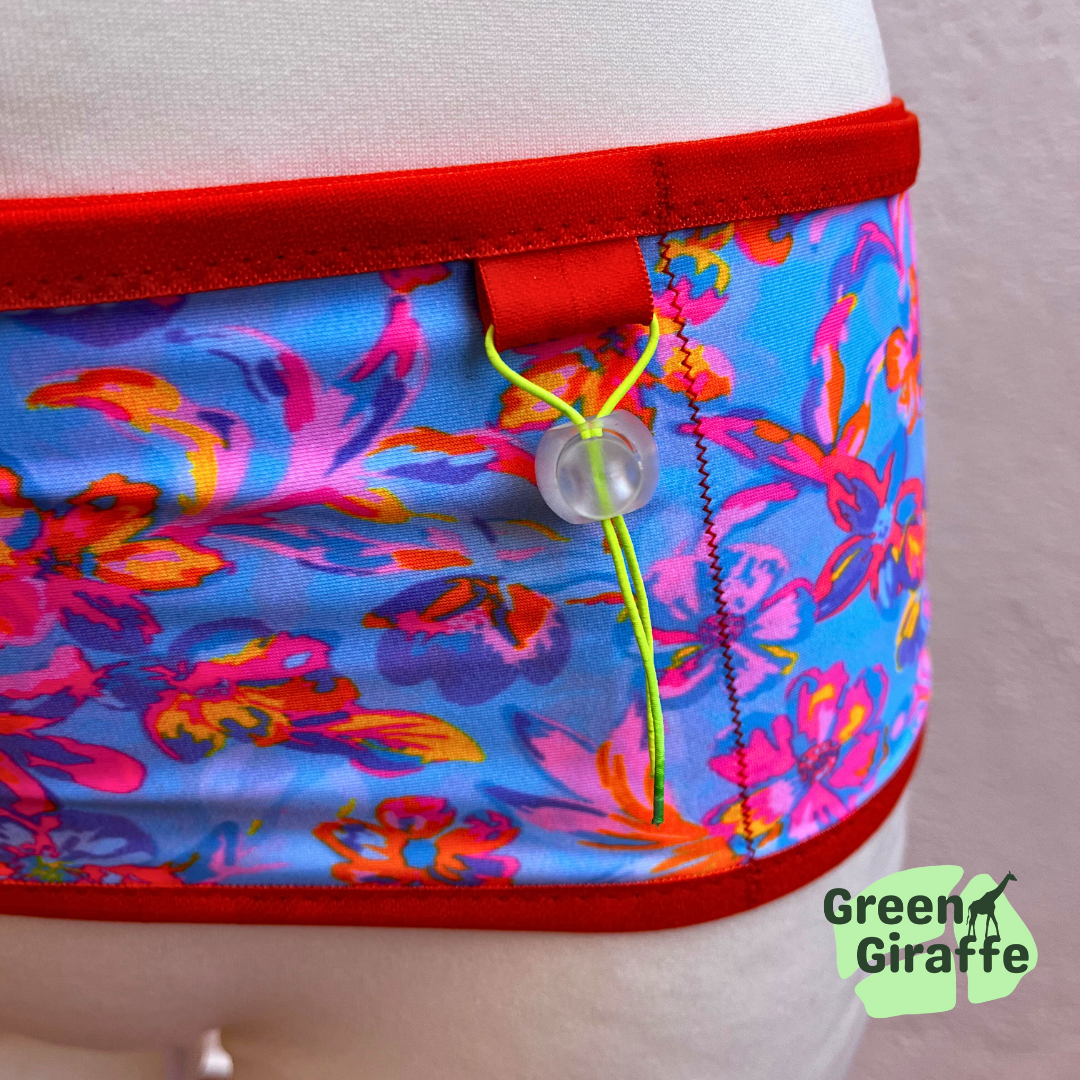 RunPouch Running Belt in Azelea, sleek design with secure storage for active use.