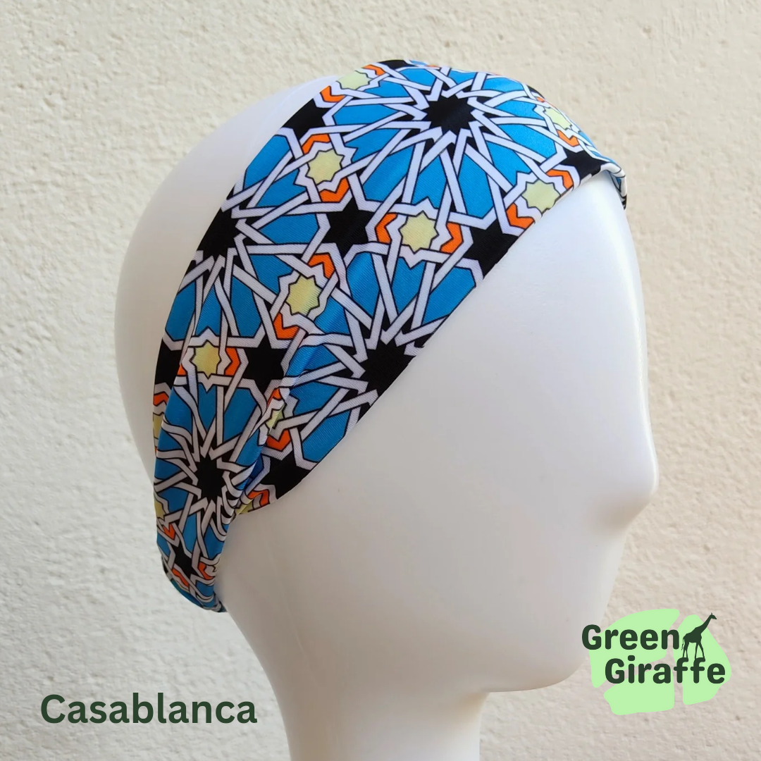 Elasticated headband for women, featuring a sleek elastic section for a secure and adjustable fit.