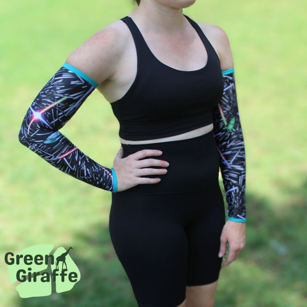 Intergalactic Arm Cozies, cosmic design with starry details for workouts and casual outfits.